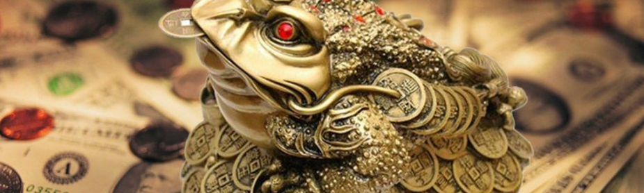 Un crapaud avec une pièce dans la bouche - un talisman pour attirer de l'argent
